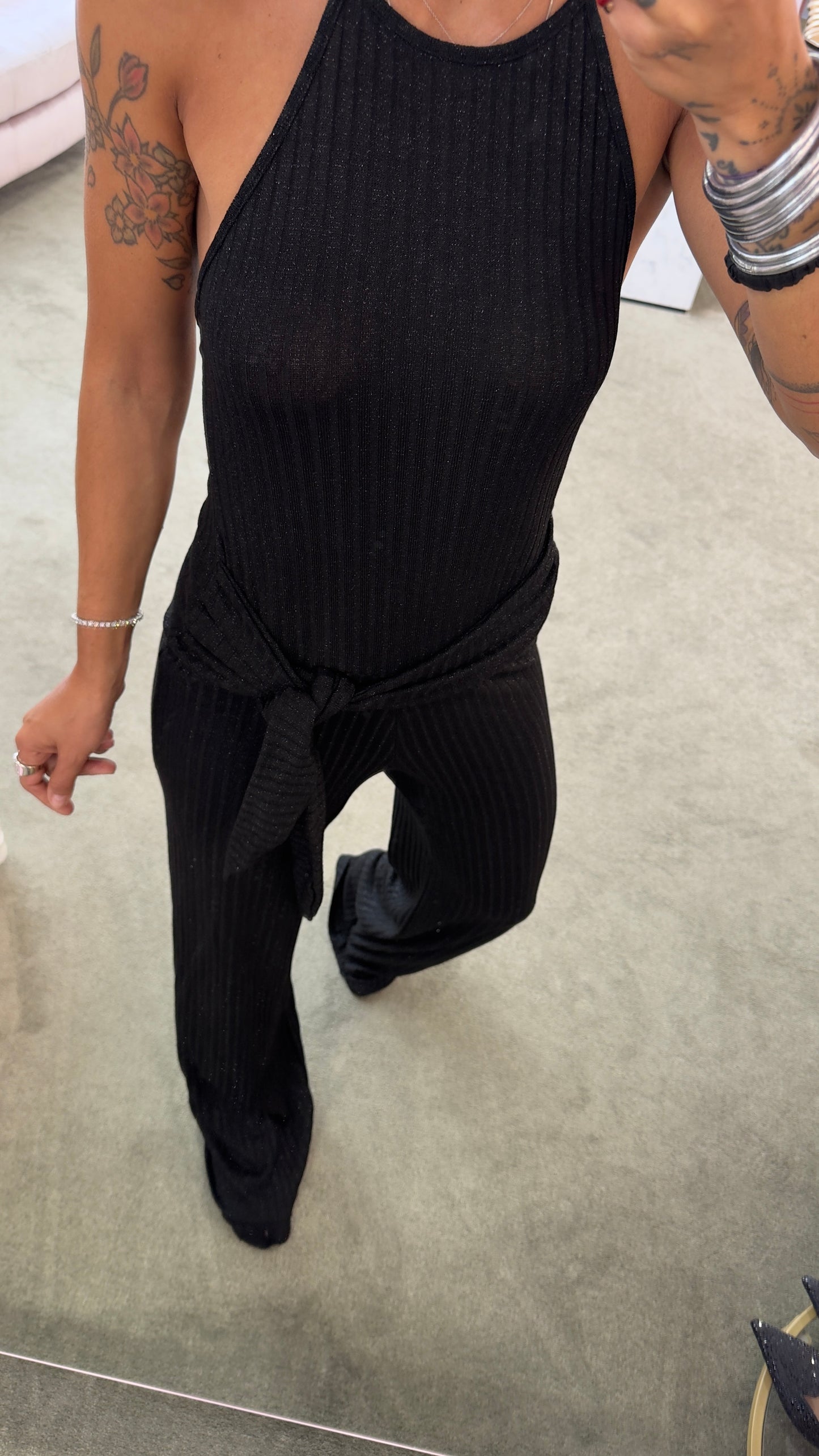 Jumpsuit nera in maglia a costine Cotazur