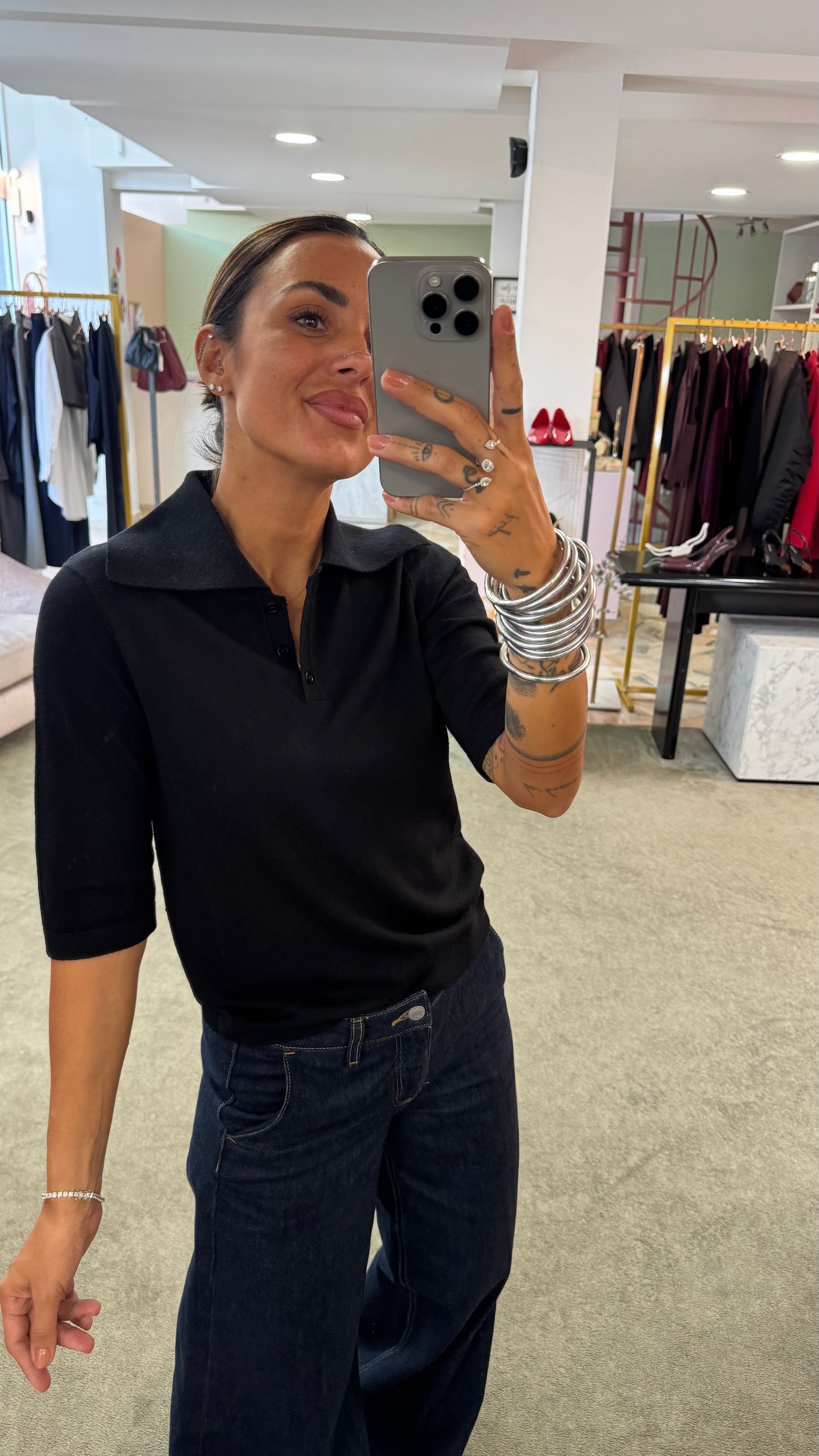 Polo nera maniche corte in lana sl