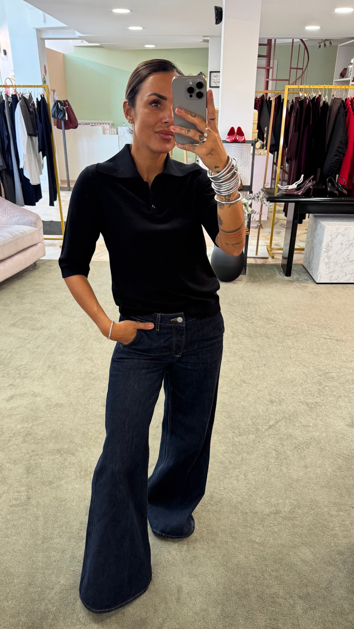 Polo nera maniche corte in lana sl