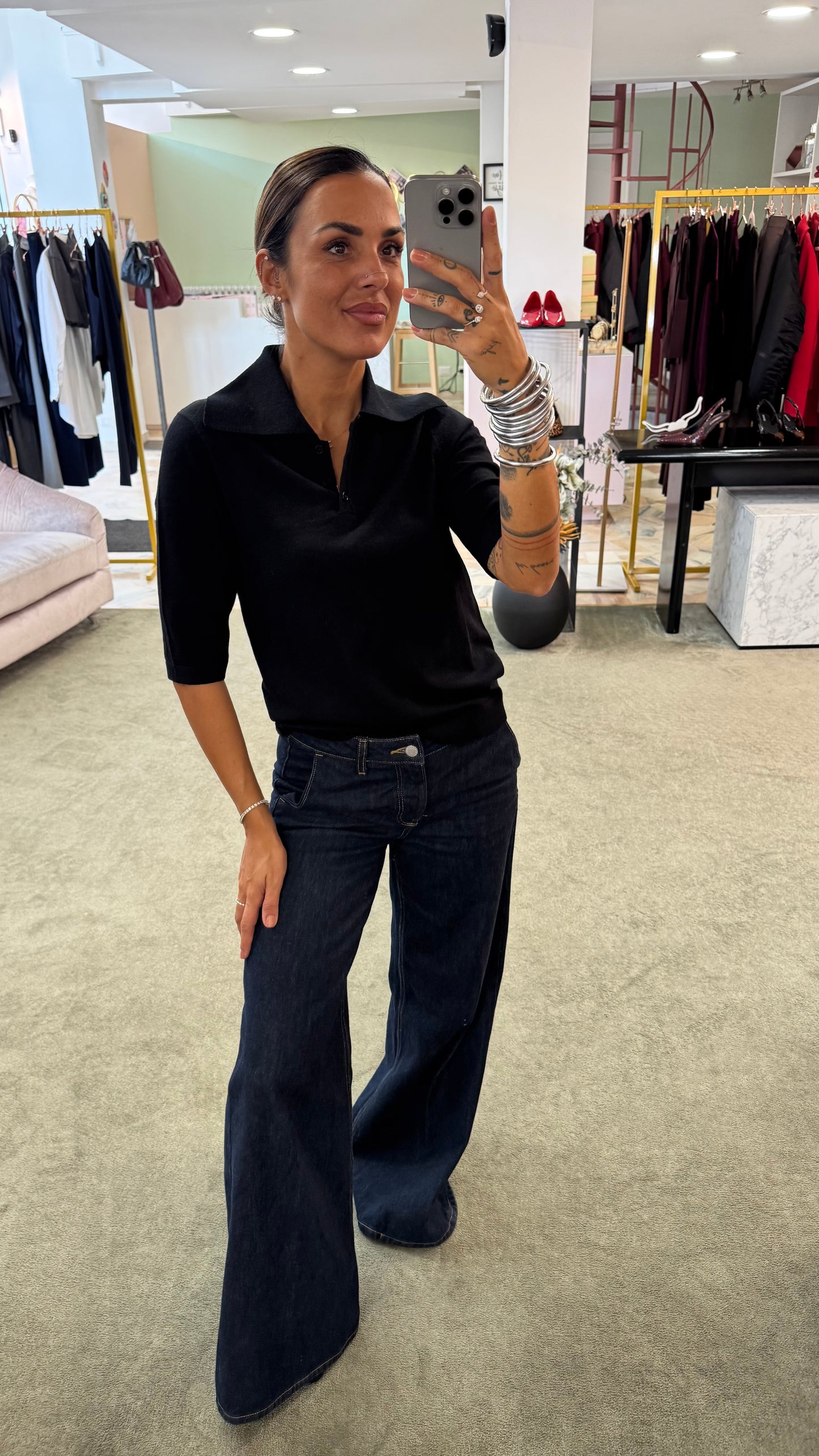Polo nera maniche corte in lana sl