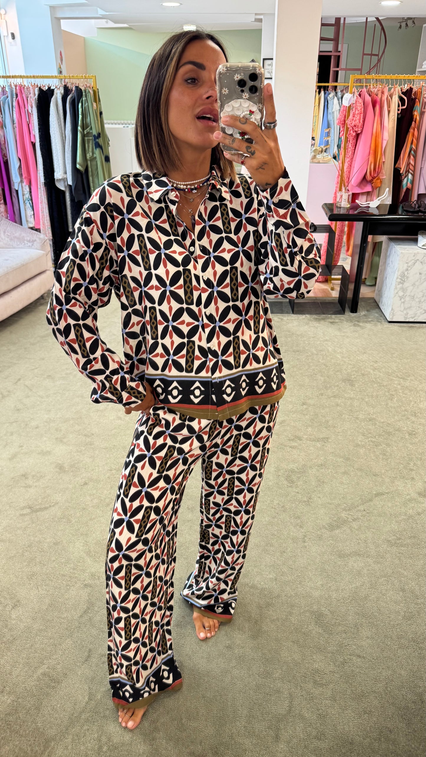 Pantaloni neri fantasia fiori sy
