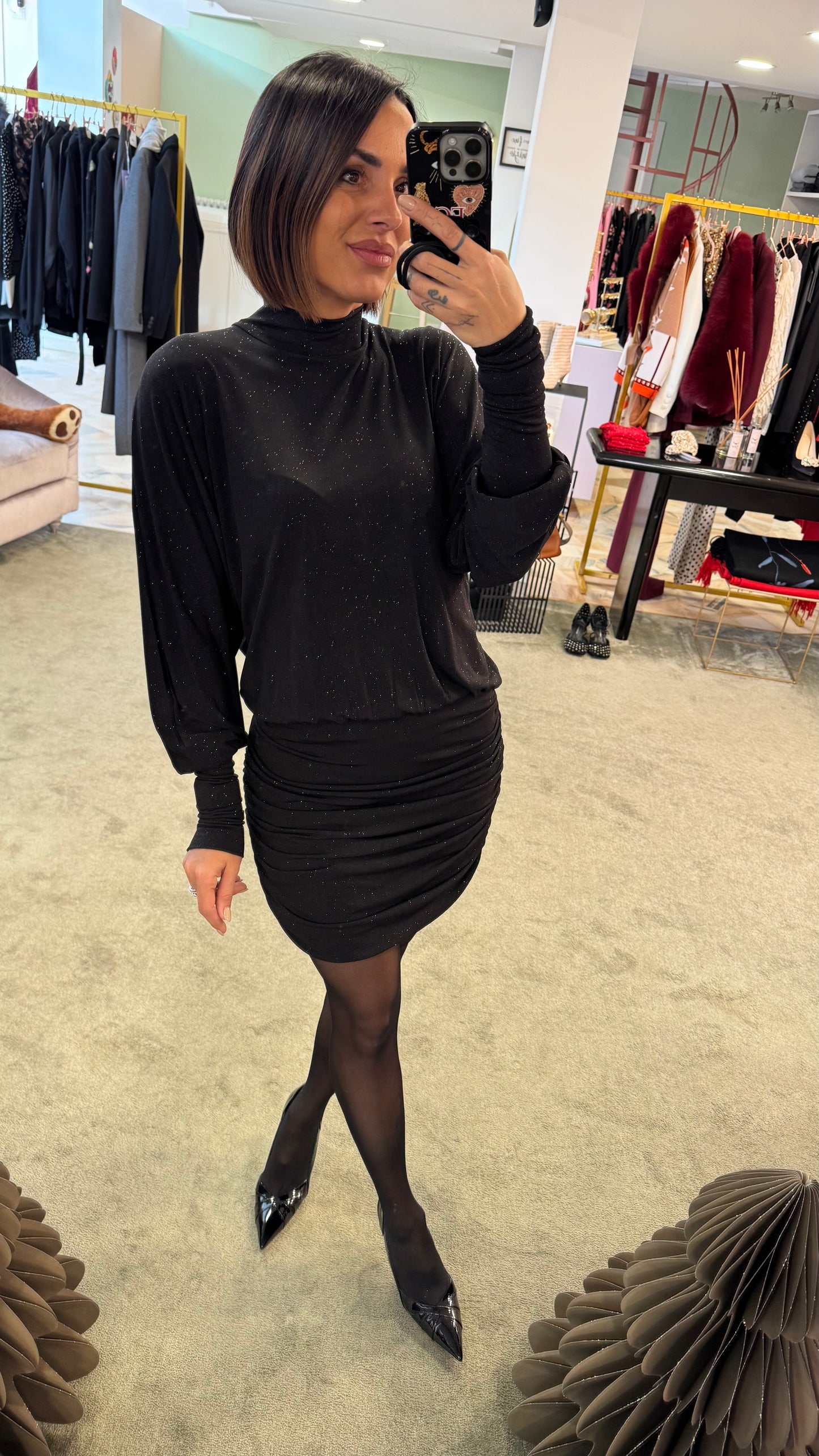 Abito lupetto nero lurex con drappeggio laterale