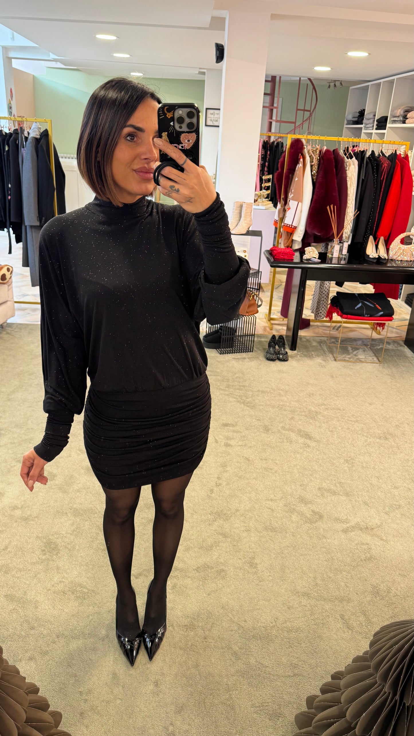 Abito lupetto nero lurex con drappeggio laterale