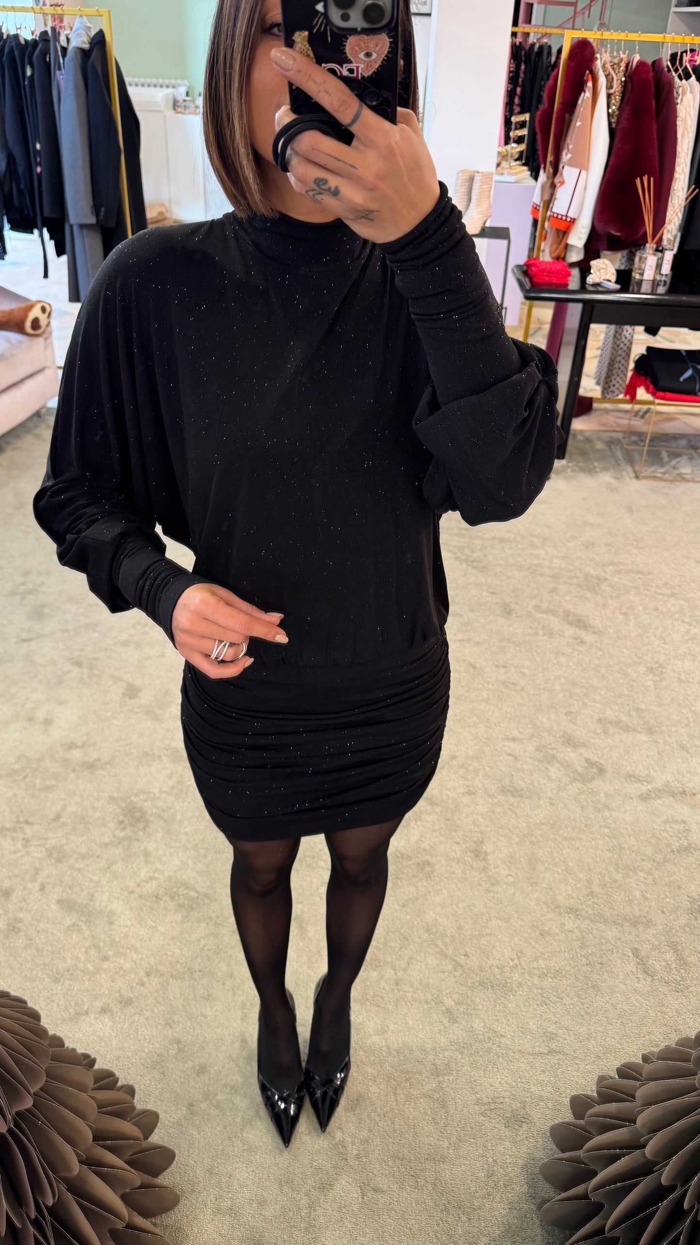 Abito lupetto nero lurex con drappeggio laterale