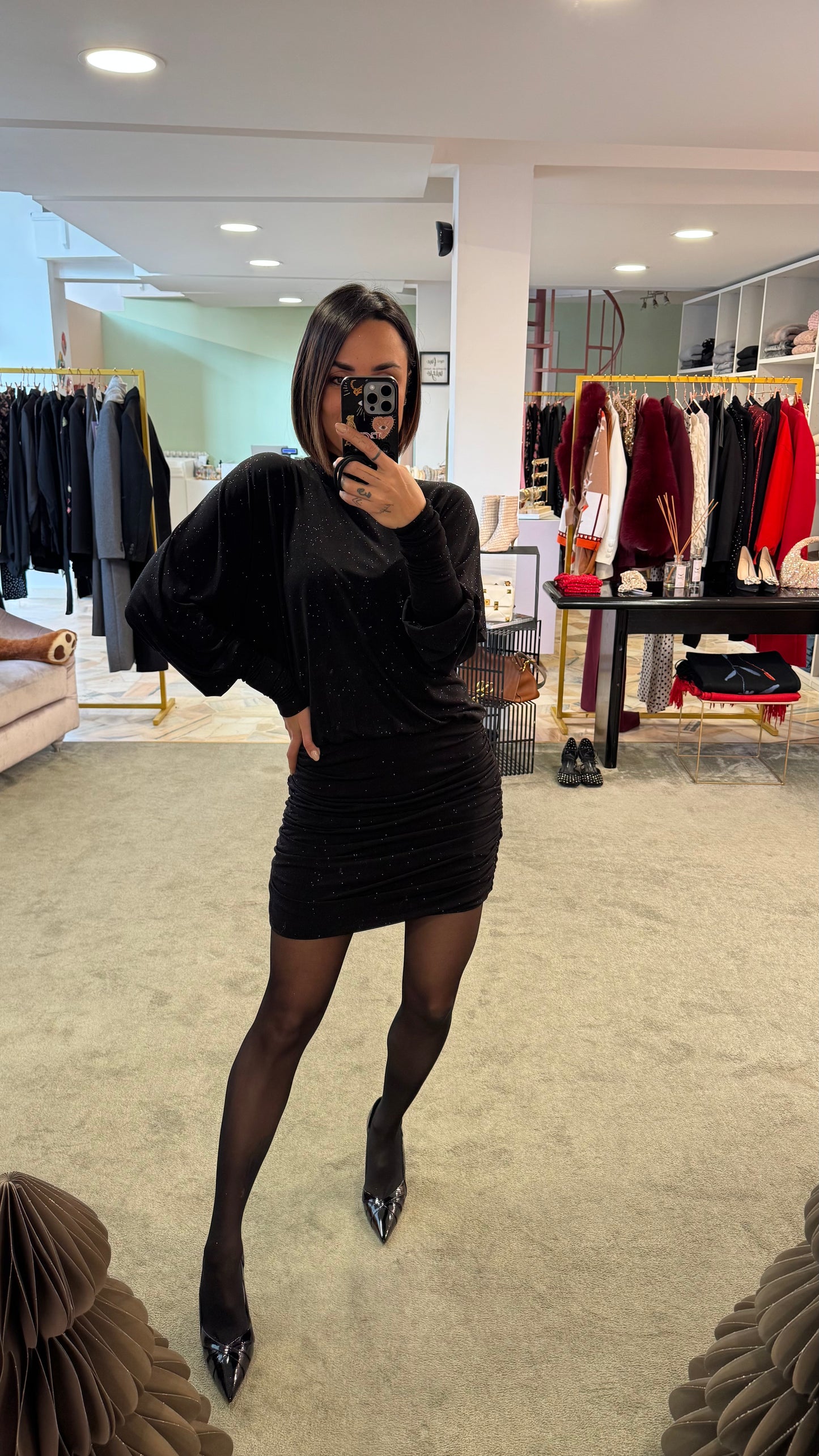 Abito lupetto nero lurex con drappeggio laterale