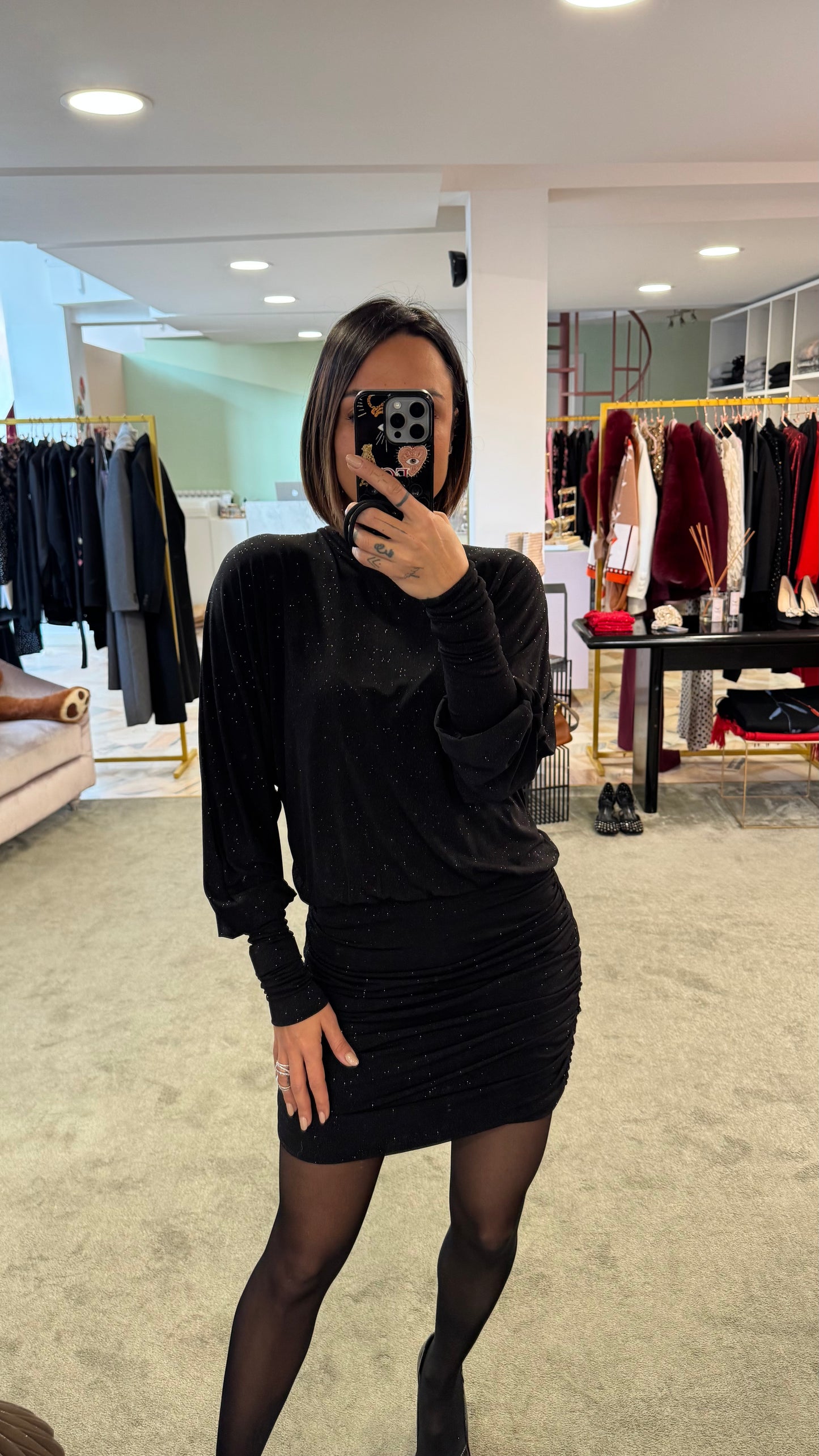 Abito lupetto nero lurex con drappeggio laterale