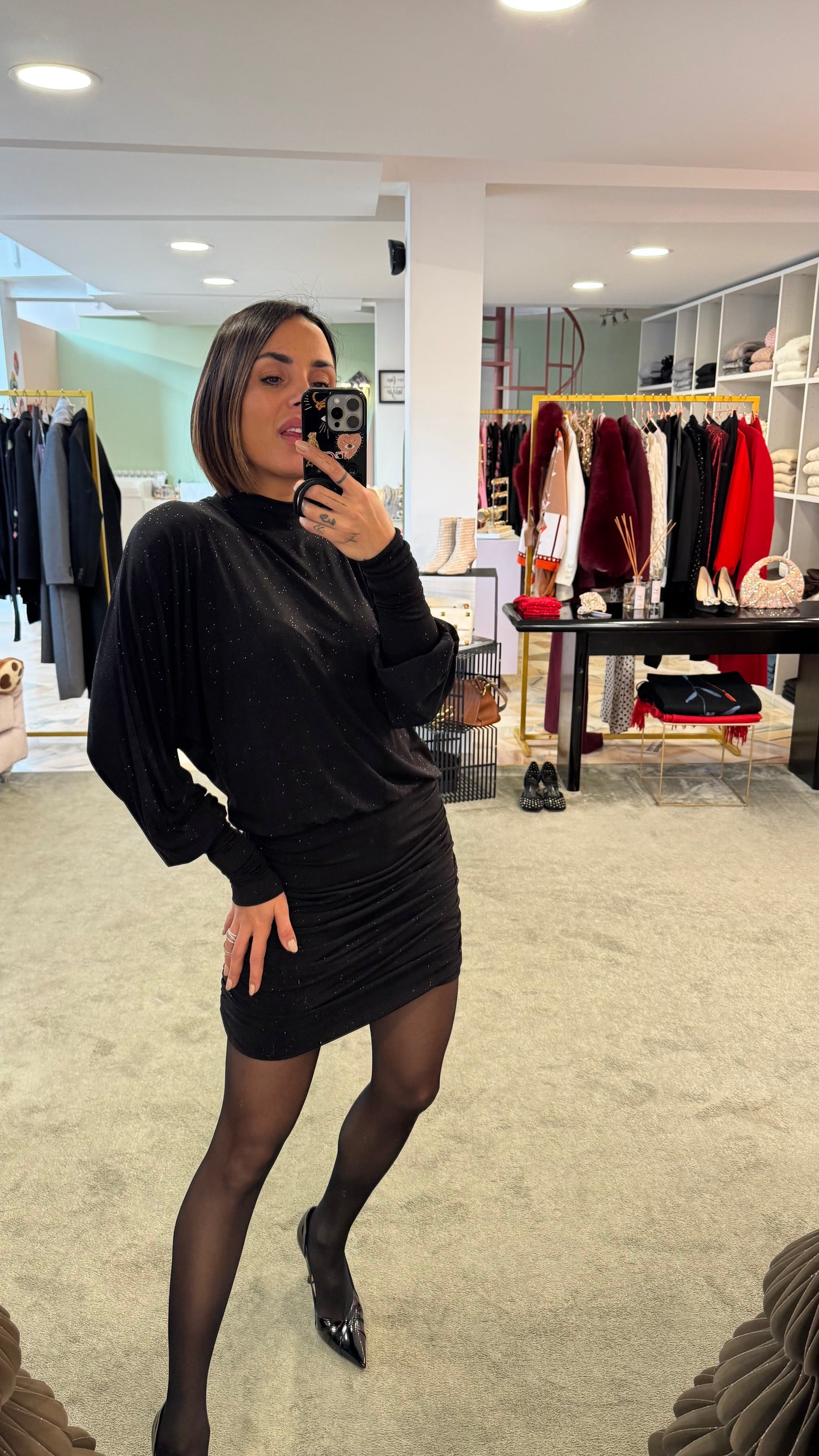 Abito lupetto nero lurex con drappeggio laterale