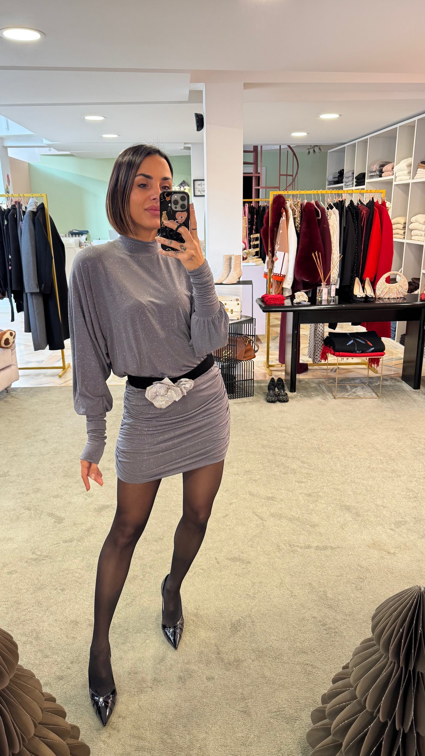 Abito lupetto grigio lurex con drappeggio laterale