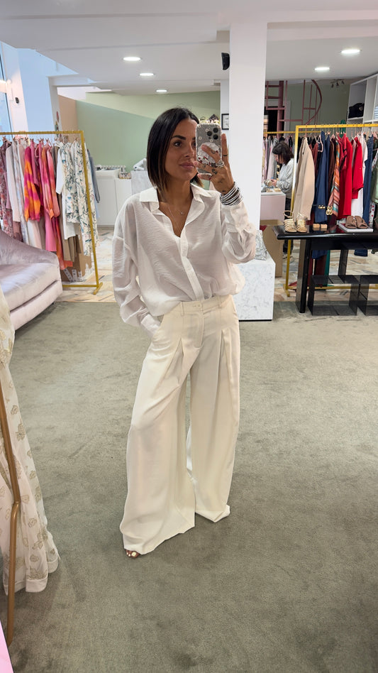 Pantaloni bianco burro a palazzo con pences ay
