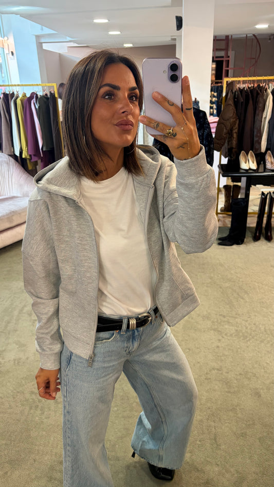 Felpa grigio chiaro con cappuccio e zip sciancrata jx