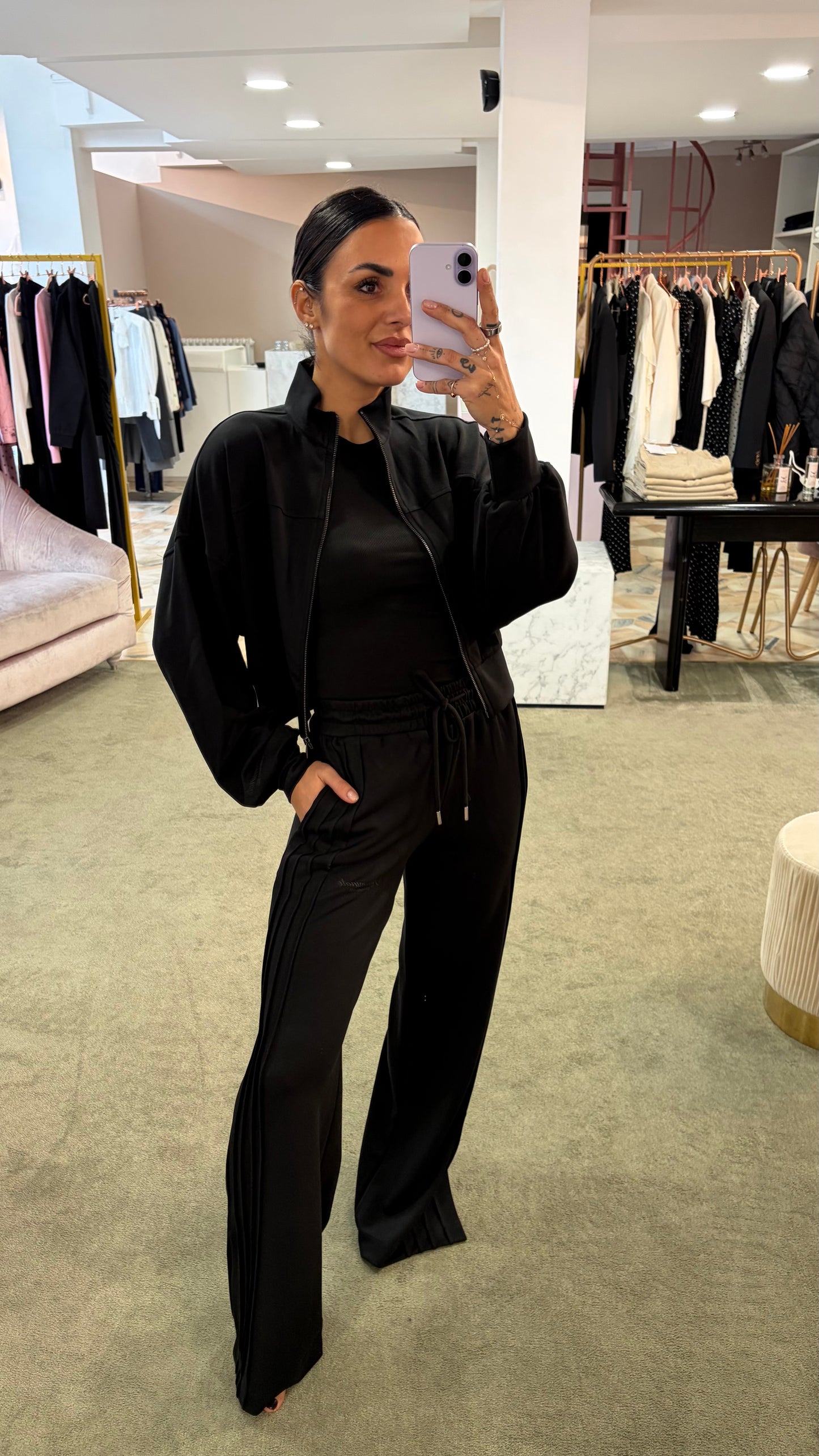 Joggers neri con spacchi laterali sul fondo Hinnominate