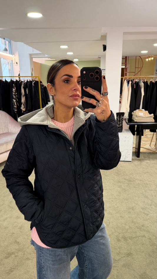 Piumino blu notte trapuntato con cappuccio in felpa sy