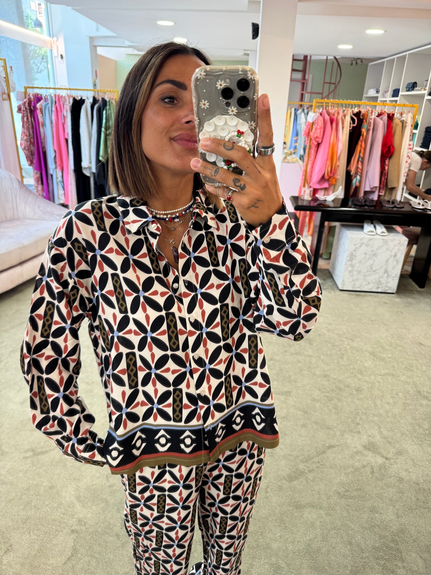 Pantaloni neri fantasia fiori sy