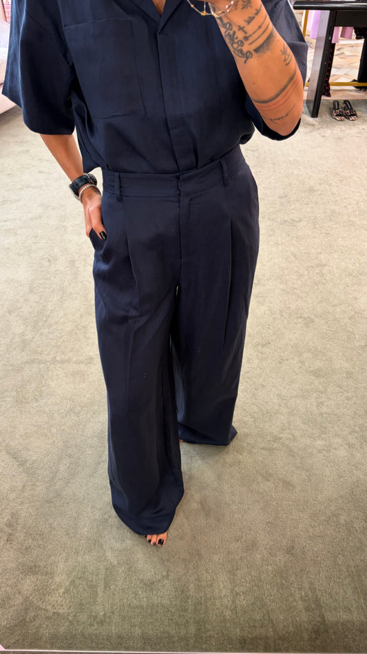 Pantaloni blu notte a palazzo con pences sl