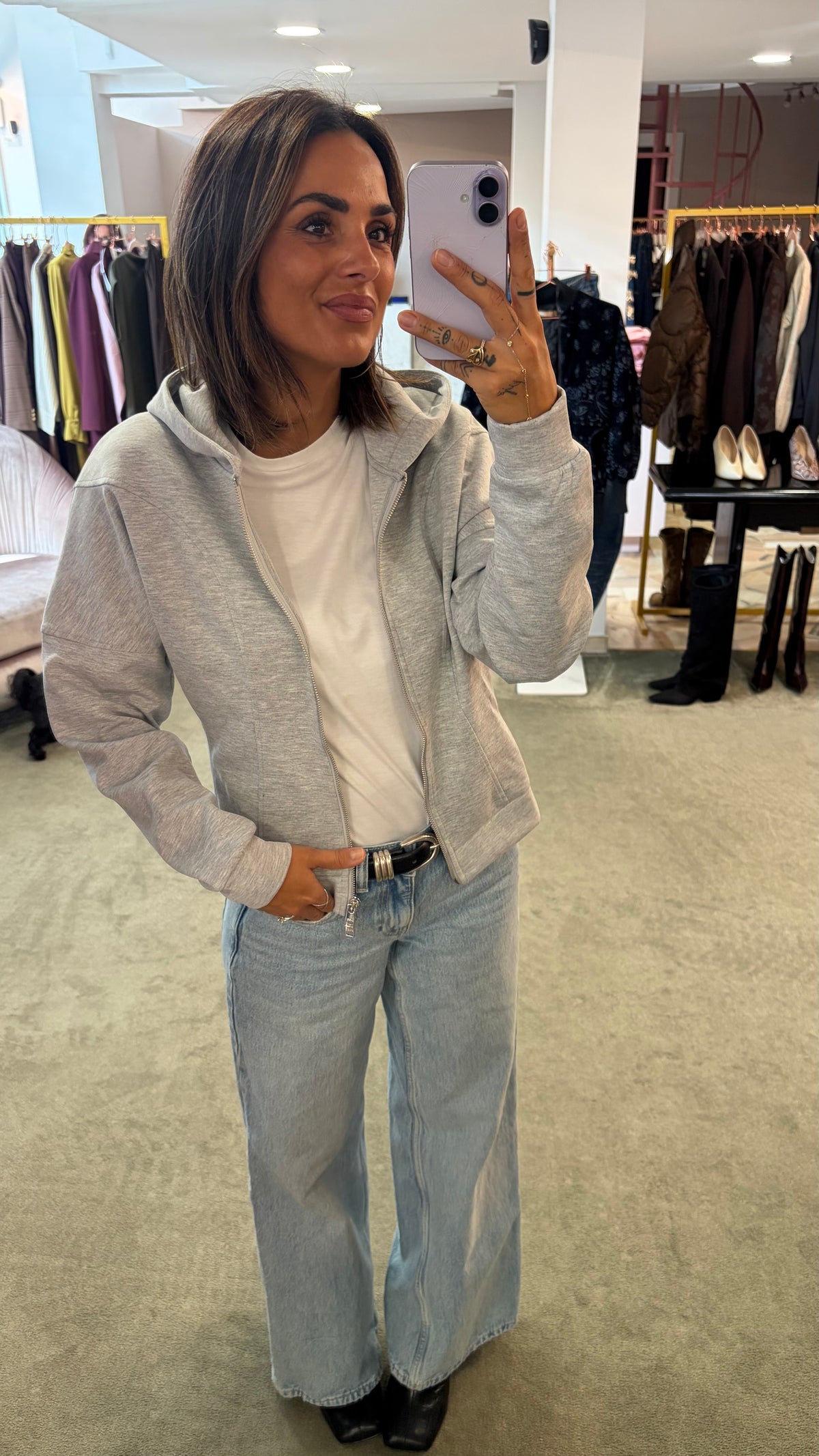 Felpa grigio chiaro con cappuccio e zip sciancrata jx