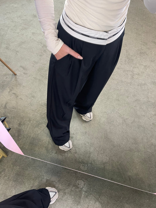 Pantaloni neri wide leg con risvolto hinnominate