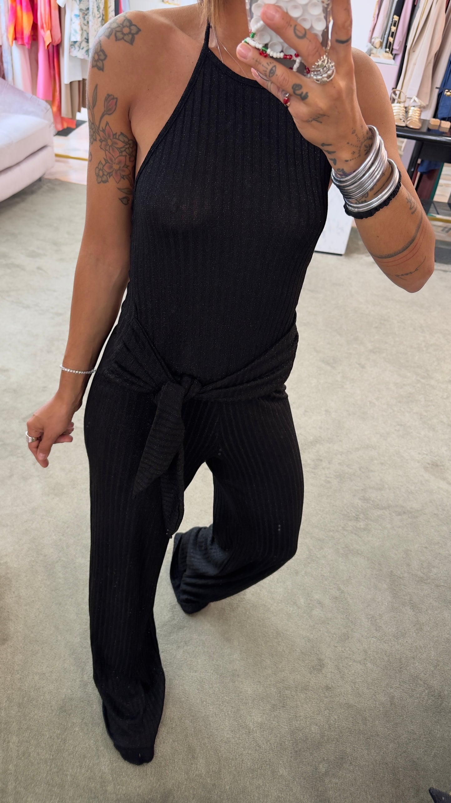 Jumpsuit nera in maglia a costine Cotazur