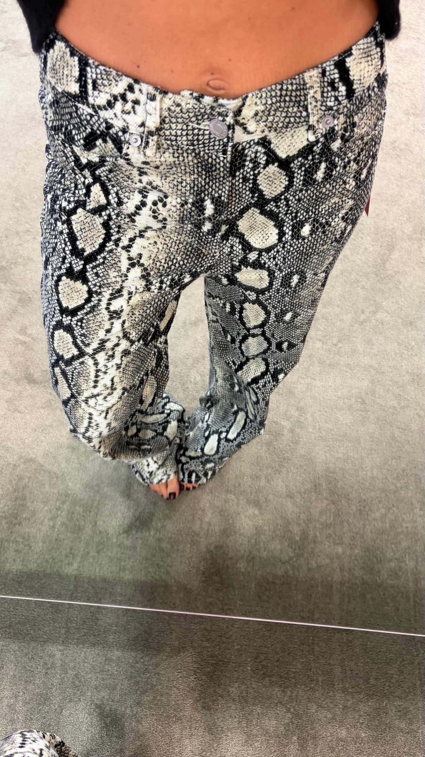 Pantaloni pitonati a costine in velluto jx