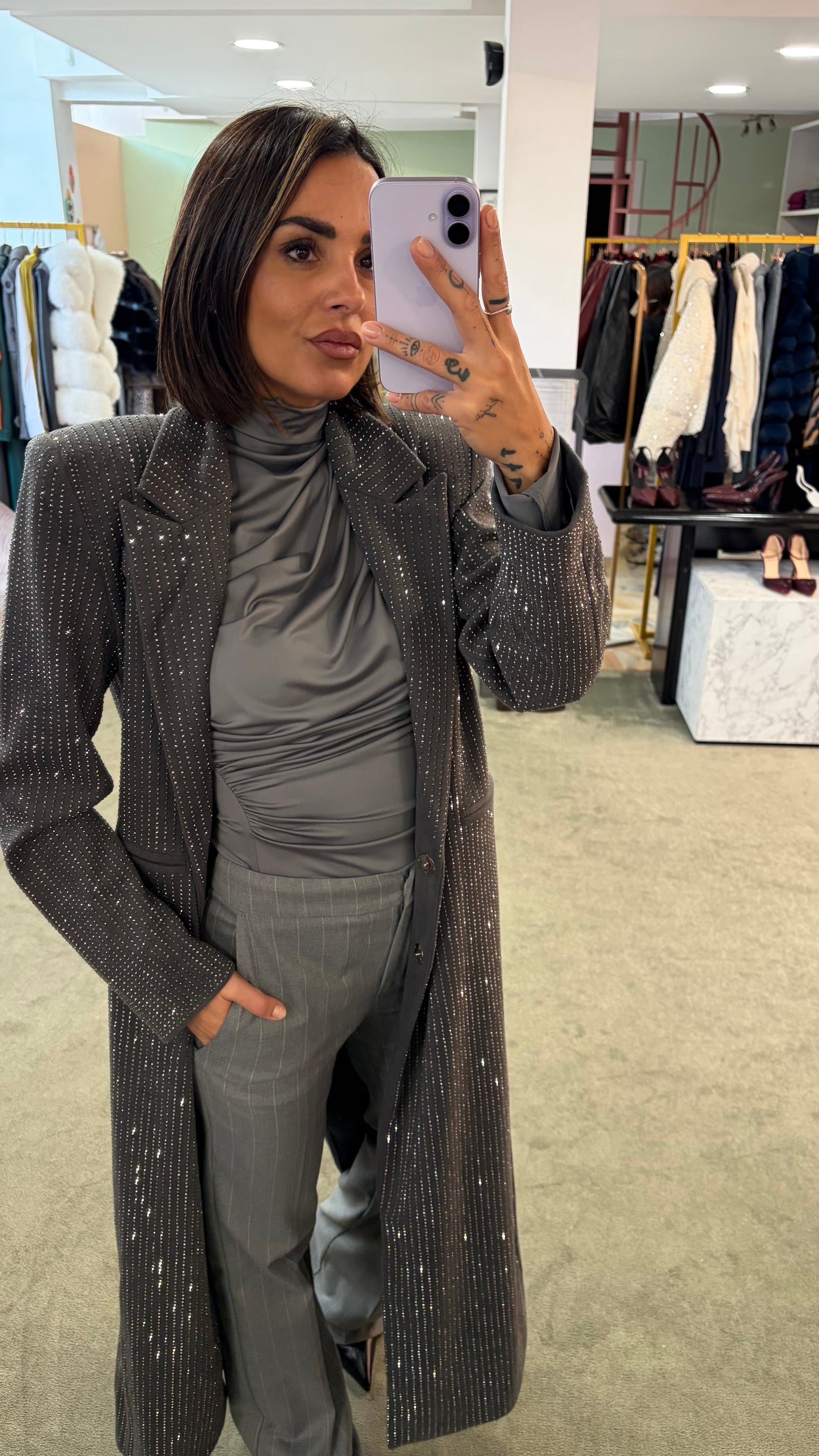 Maglia grigia manica lunga drappeggiata ks