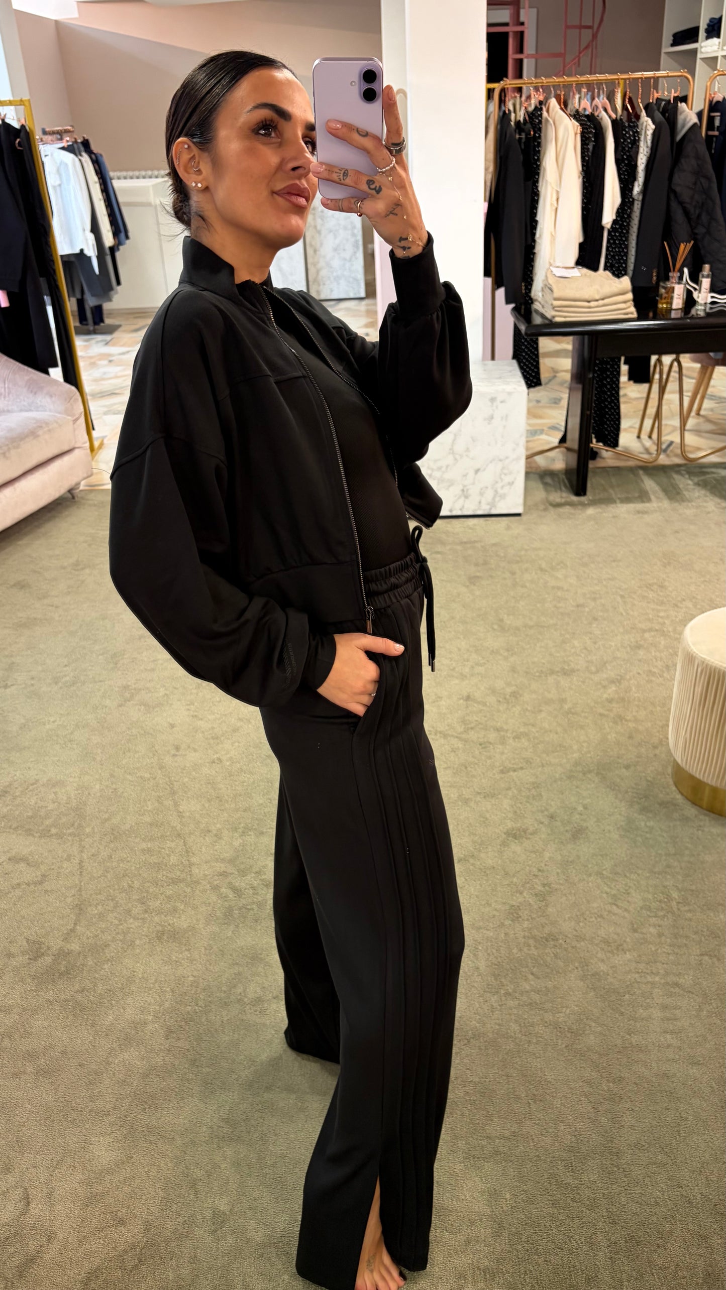 Joggers neri con spacchi laterali sul fondo Hinnominate