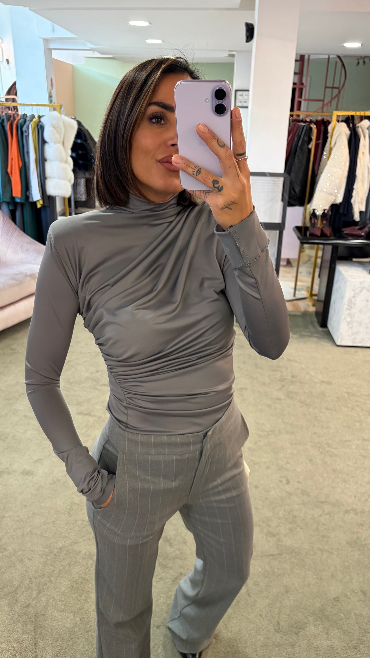 Maglia grigia manica lunga drappeggiata ks