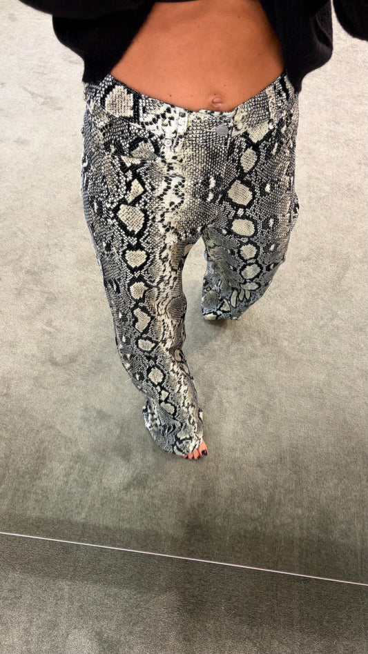 Pantaloni pitonati a costine in velluto jx