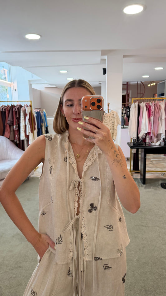 Gilet beige melange con fiocchetti e ricami in paillettes glp