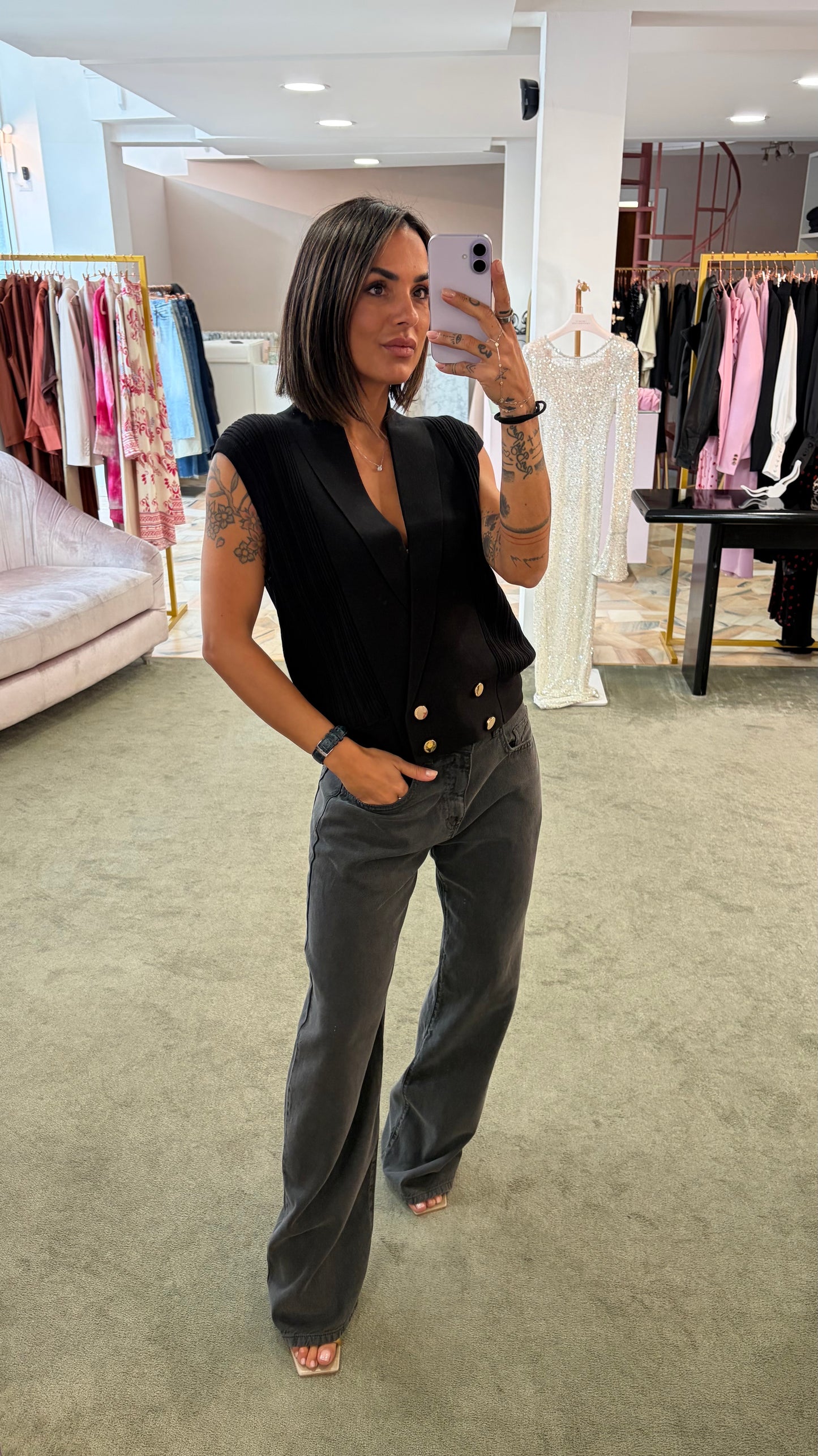 Gilet nero in maglia con bottoni oro fr