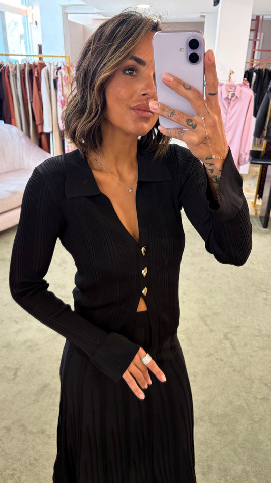 Cardigan polo nera a costine con bottoni oro bj