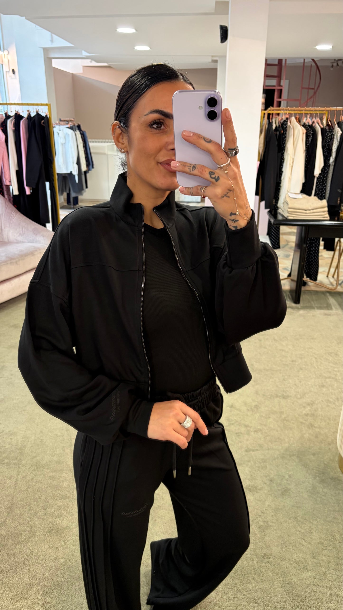 Joggers neri con spacchi laterali sul fondo Hinnominate