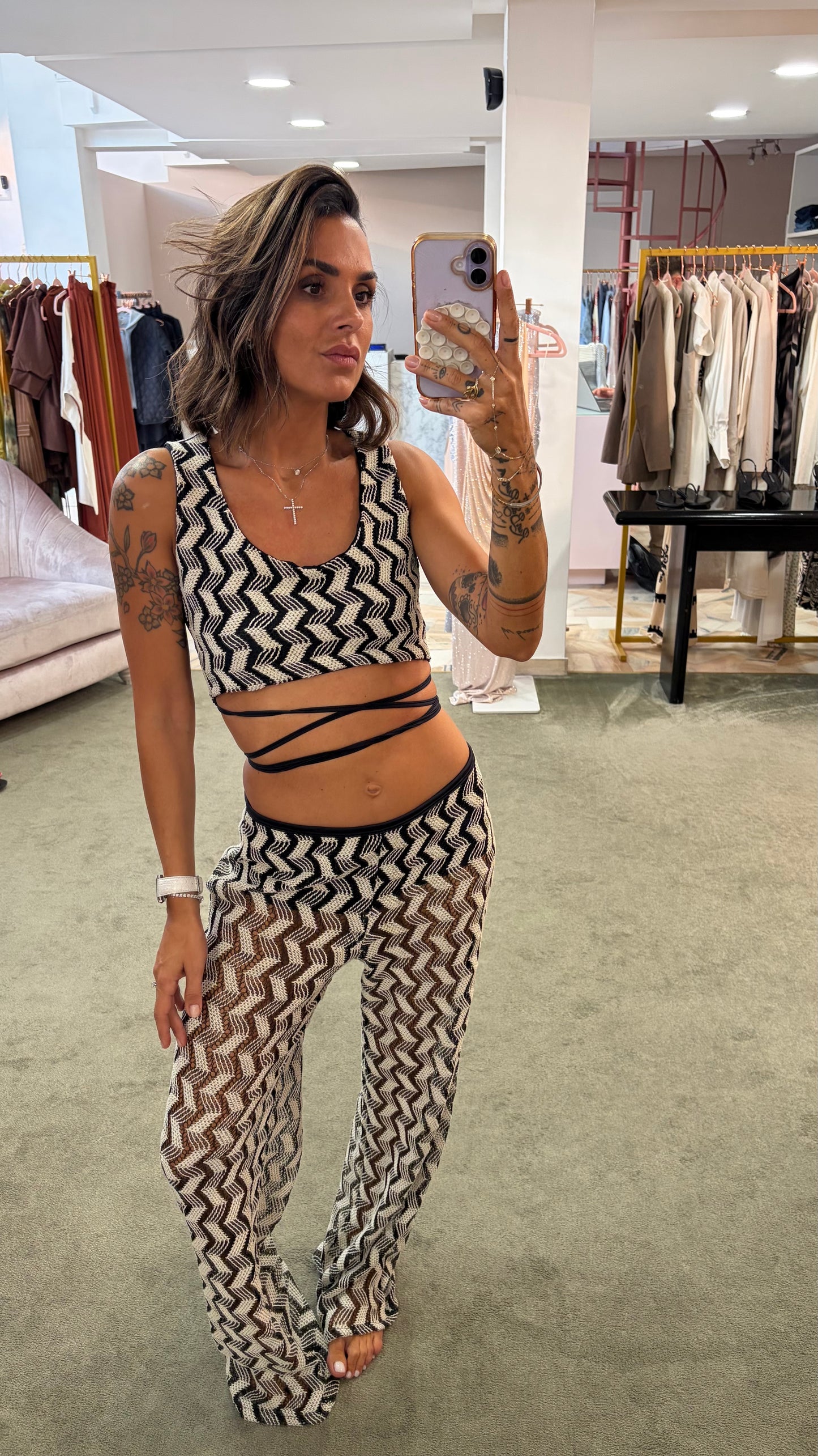 Pantaloni in maglia bicolor bianchi e neri a zig zag Cotazur