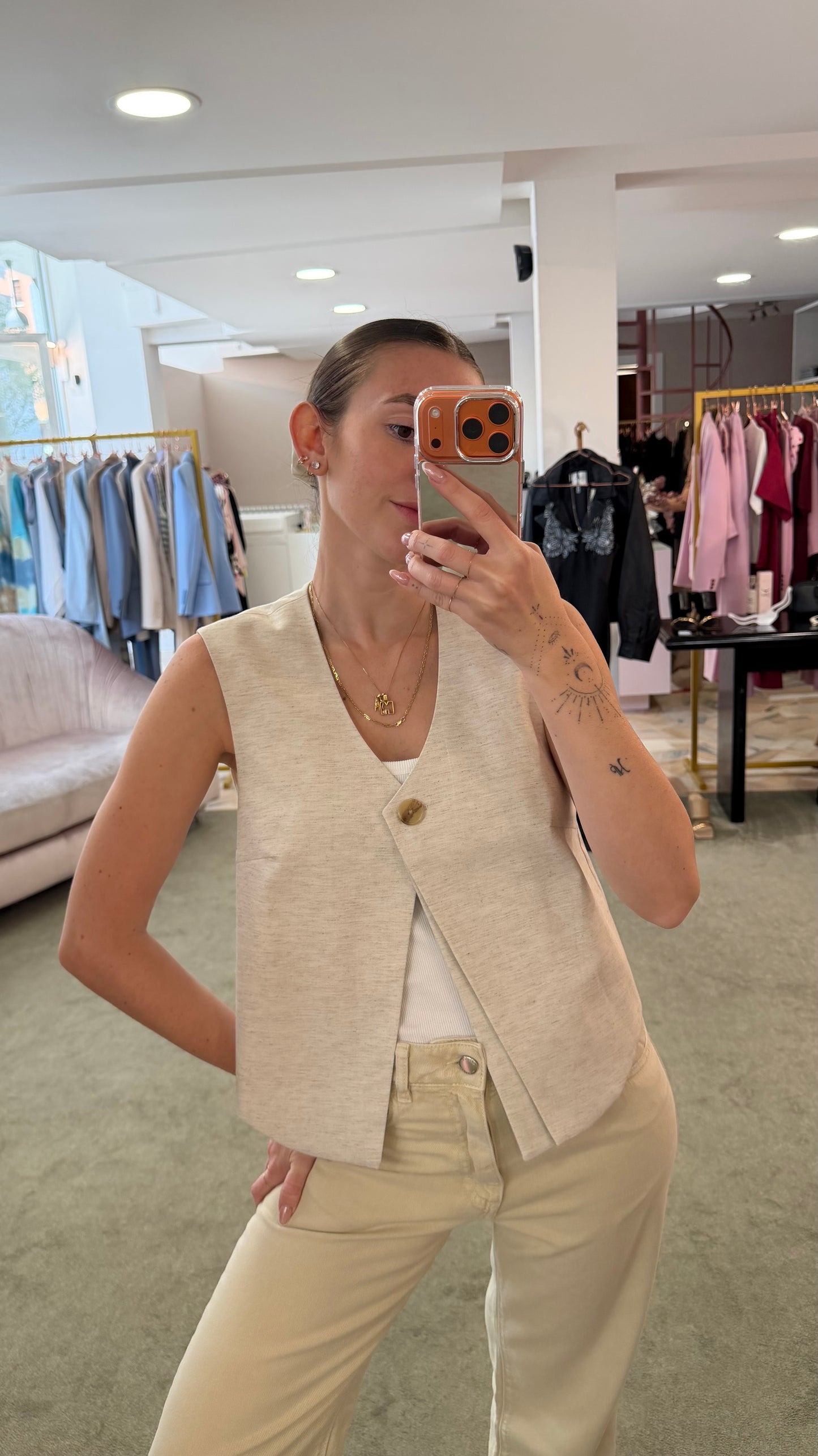 Gilet ecrù melange con un bottone jx