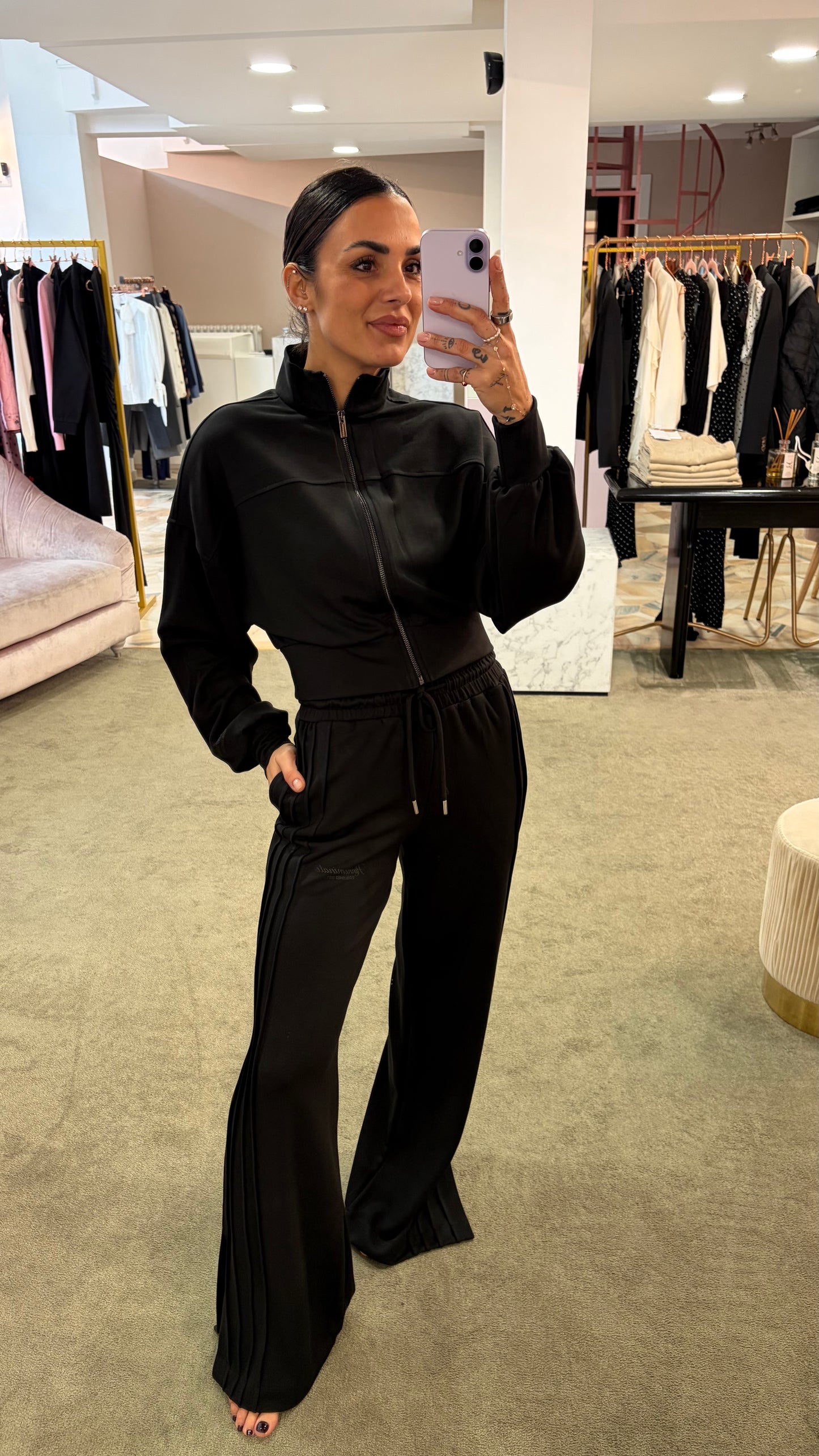 Joggers neri con spacchi laterali sul fondo Hinnominate