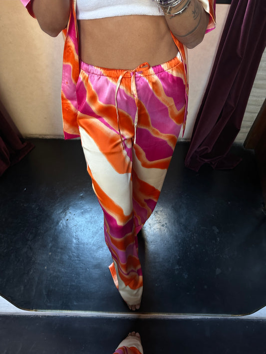 Pantaloni con coulisse arancio e fucsia fantasia